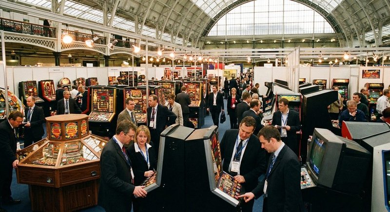ATEI exhibition floor at Earls Court London, packed with coin-op amusement machines and trade visitors